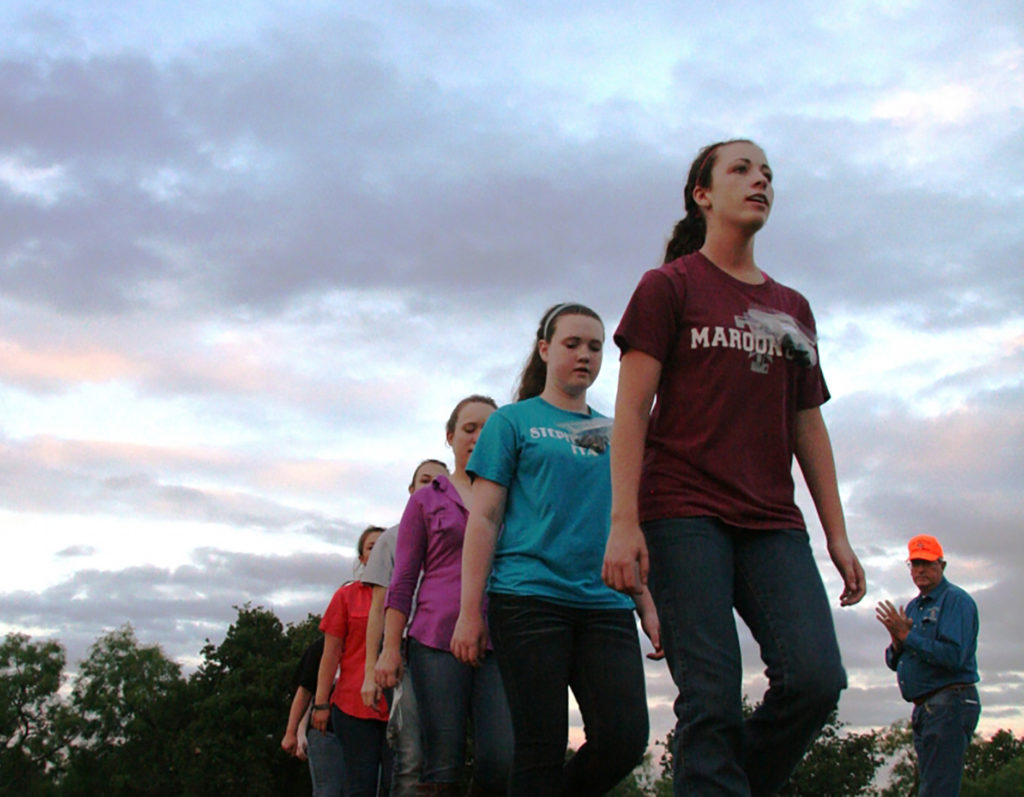 girls lined up on the first day outside at a Texas Brigades camp