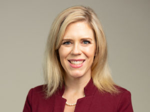 A headshot of a woman wearing a maroon blazer, Jennifer Ann Scasta, is new senior director of development for Texas A&M AgriLife.