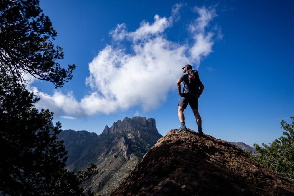 Hiker standing atop mountain at Big Bend