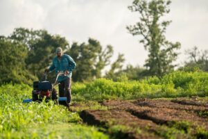 A man tilling a field