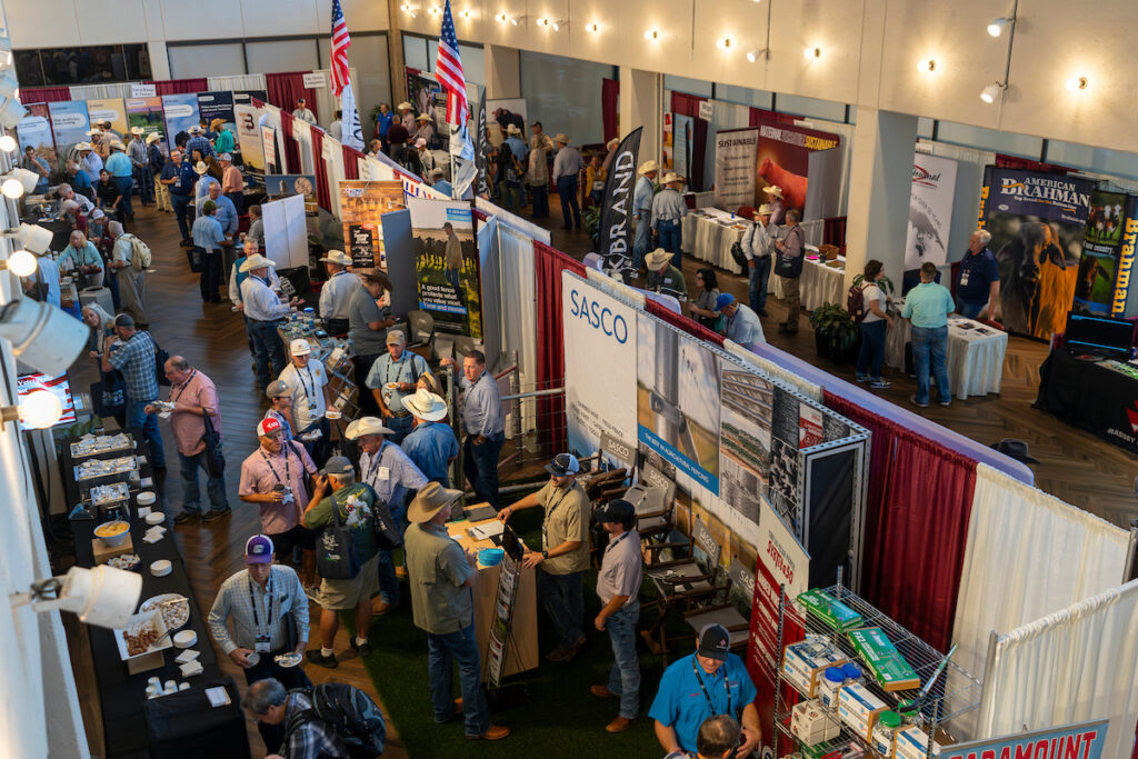 a trade show area filled with people