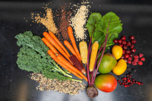 Fresh vegetables on a black background.