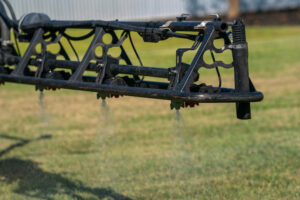 a black spray bar for chemical applicators